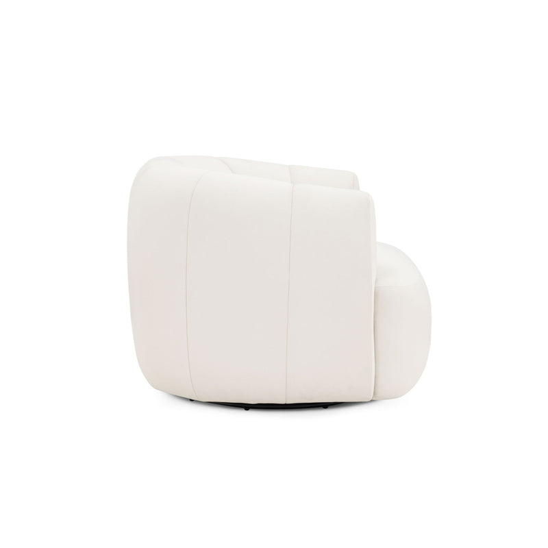 Jasmine TOV Furniture swivel accent chair with plush upholstery and modern design, shown in a cozy living room setting.