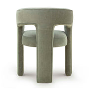 TOV Furniture Malone dining arm chair with plush upholstery and wooden legs, modern design for dining room decor.