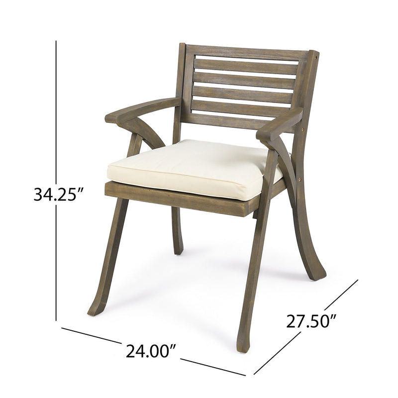 Set of two Noble House Helen outdoor dining chairs in acacia wood with gray and creme cushions, designed for patio or garden use.