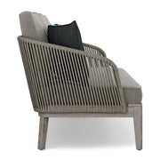 Simpli-Home Carmel outdoor sofa in Sand Drift color with plush cushions, designed for comfortable outdoor seating.