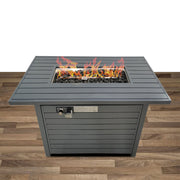 Gray propane outdoor fire pit table with lid by LSI Patio Furniture, featuring a sleek design and sturdy construction.