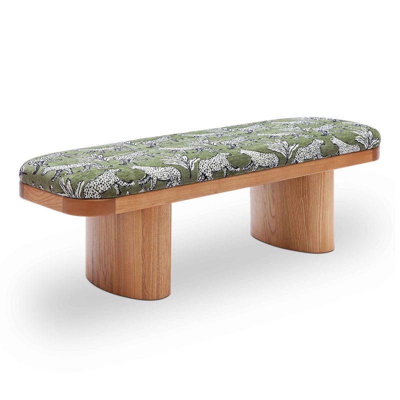 Upholstered Ollie bench by TOV Furniture featuring a sleek design with cushioned seating and wooden legs.