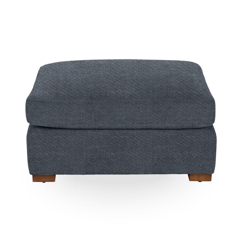 Classic Home Audrey upholstered ottoman with cushioned top and wooden legs, versatile for living room or bedroom décor.