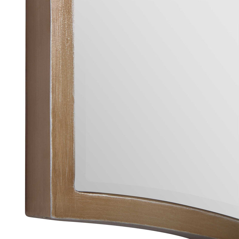 Gold Cerise wall mirror by Uttermost featuring a sleek, round design with a polished gold frame and reflective glass surface.
