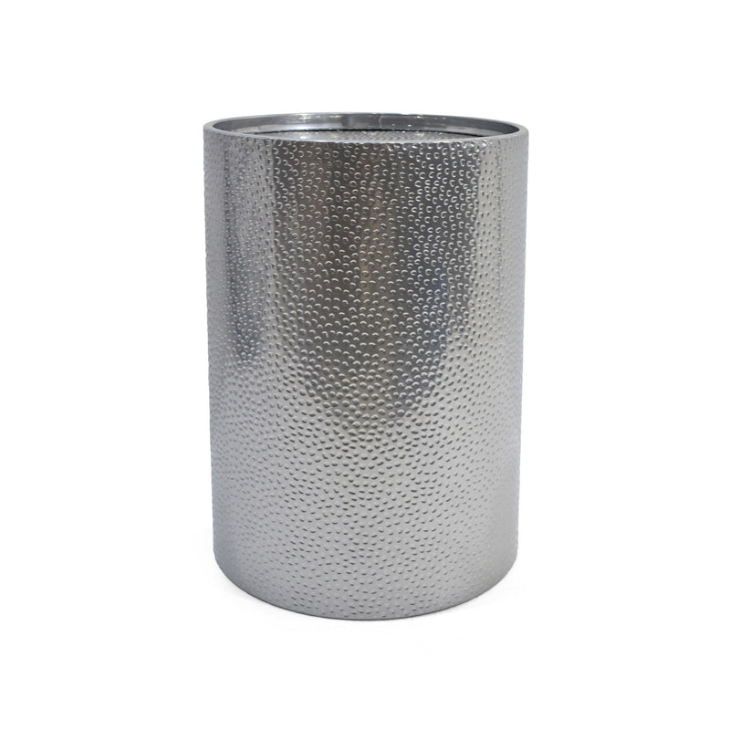 Noble House modern round accent table with hammered surface, sleek design, and sturdy metal base for stylish interior decor.
