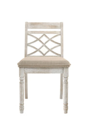 Pair of Lilola Home Havanna wide chairs with cushions in off-white, featuring a modern design and comfortable seating.
