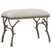 Uttermost Lismore small beige fabric accent bench with cushioned top and wooden legs, ideal for living room or bedroom decor.
