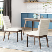 Noble House upholstered dining chairs with rubber legs, set of 2, featuring plush fabric and modern design for dining room decor.