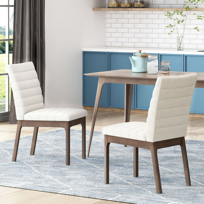 Noble House upholstered dining chairs with rubber legs, set of 2, featuring plush fabric and modern design for dining room decor.