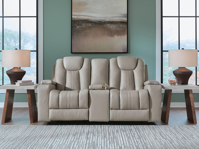 Signature Design by Ashley Elevate Edges Glide Reclining Loveseat with console in coin fabric, showing plush cushions and reclining feature