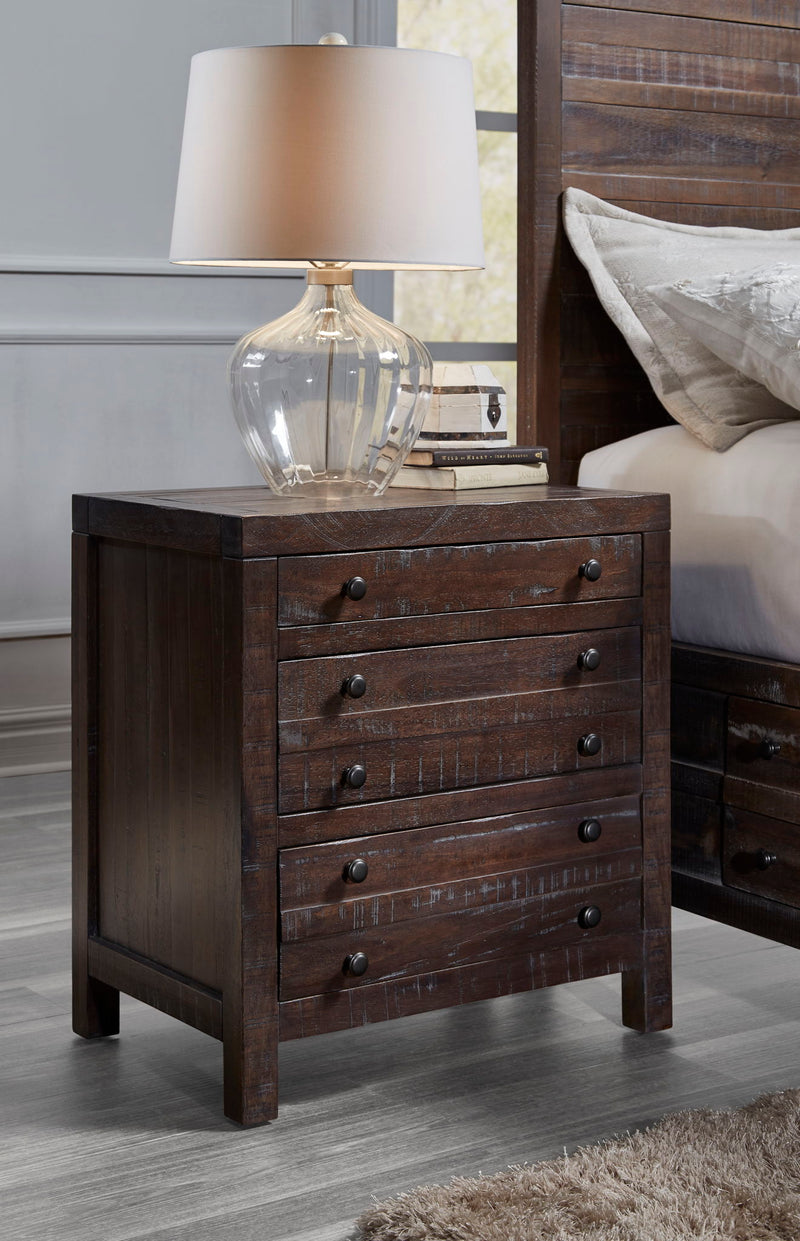 Modus Townsend solid wood nightstand with three drawers in Java finish, showcasing its sturdy design and natural wood grain.