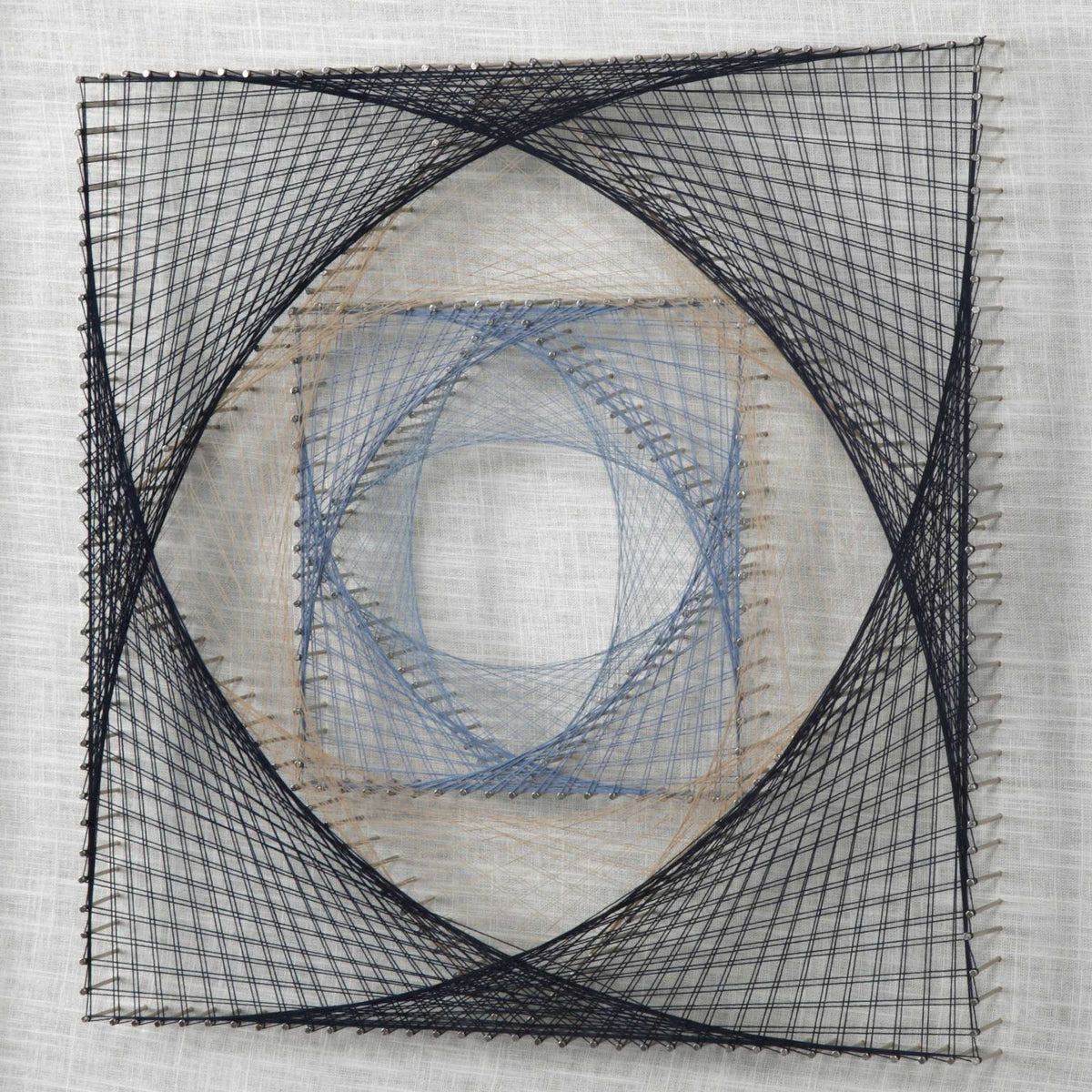 Uttermost String Duet black geometric wall decor set of 2 featuring modern, abstract metal art pieces mounted on a wall.