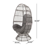 Noble House patio swivel basket egg chair with cushion, outdoor accent chair, woven rattan design, and plush seating for relaxing outdoors.