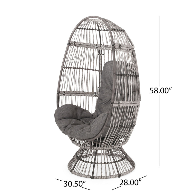 Noble House patio swivel basket egg chair with cushion, outdoor accent chair, woven rattan design, and plush seating for relaxing outdoors.