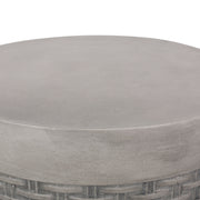 Round concrete outdoor end table from Noble House, lightweight natural finish, perfect for patio or garden seating areas.
