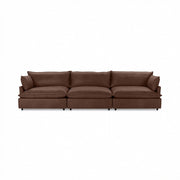 Classic Home Caplan modular sectional sofa with plush fabric cushions and contemporary design in a living room setting.