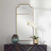Uttermost Caddington tall wall mirror with brass frame, showcasing a sleek, modern design for stylish home decor.