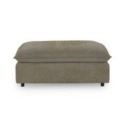 Classic Home Caplan upholstered ottoman with a plush fabric top and wooden legs, versatile for living room or bedroom decor.