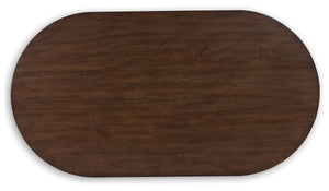 Korestone - Oval Cocktail Table - Dark Brown - R&R Furniture Gallery (Fountain Valley, CA)