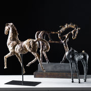 Gold horse sculpture by Uttermost, detailed dorado horse figurine with intricate craftsmanship on a sleek base.