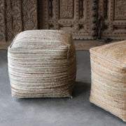Uttermost Shiro beige accent pouf with round, plush fabric design, versatile for living room or bedroom decor.