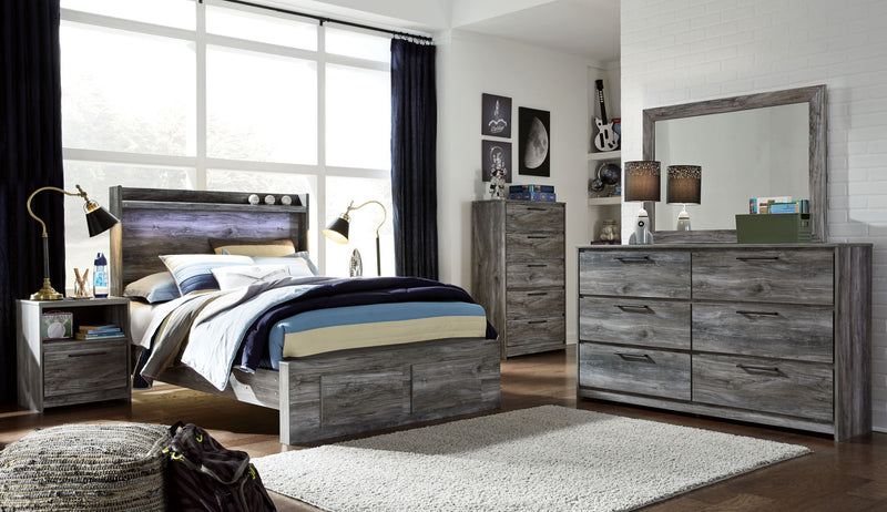 Gray Baystorm panel bedroom set by Signature Design Ashley, includes 8-piece bedroom furniture with beds, dressers, and nightstands.