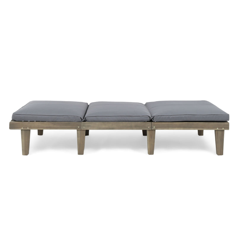 Noble House Ariana wood chaise lounge with a cushioned seat, sleek design, and modern style.