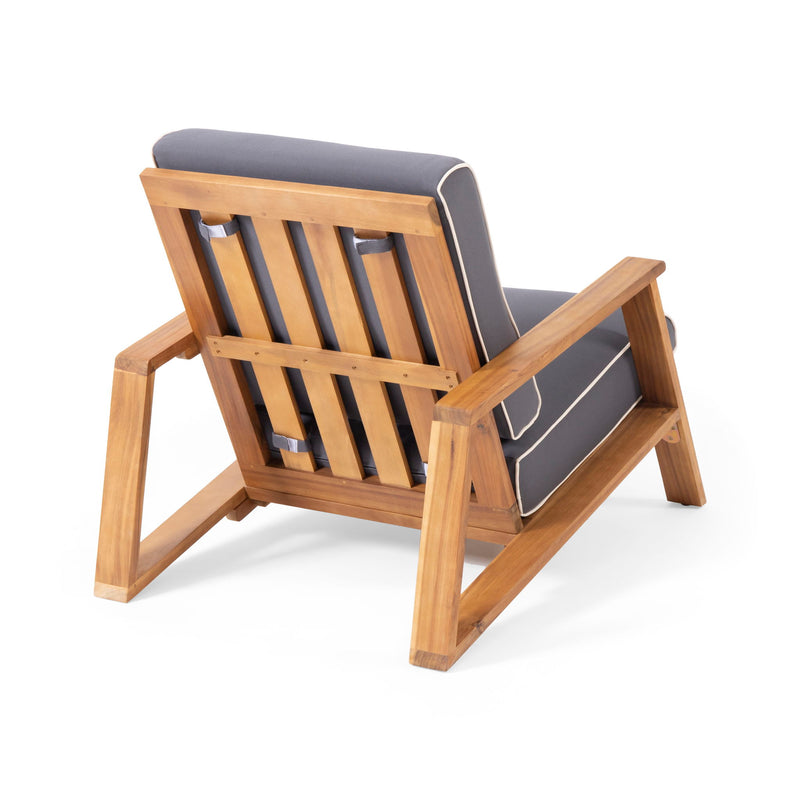Noble House outdoor patio lounge arm chair with cushioned seat and armrests for relaxing outdoor seating.