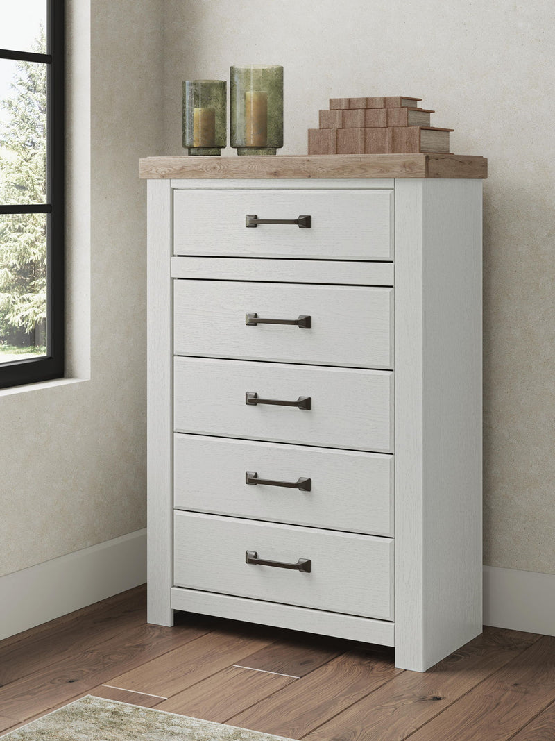 Benchcraft® Savonport five-drawer accent chest in white and brown with sleek handles and spacious storage drawers.