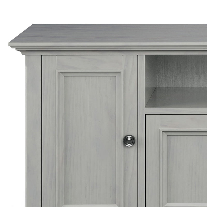 Simpli-Home Amherst wide TV media stand with open shelves and storage compartments for entertainment devices and accessories.