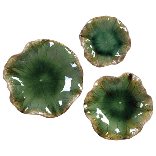 Set of three Uttermost Abella ceramic wall decor pieces featuring textured, abstract design for modern interior decoration.