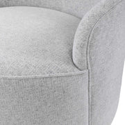 Gray Hobart casual swivel chair by Uttermost featuring a modern design and comfortable seating with a rounded back.