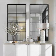 Black iron window mirror by Uttermost, featuring a vintage-inspired accent mirror design with a grid pattern and decorative frame.