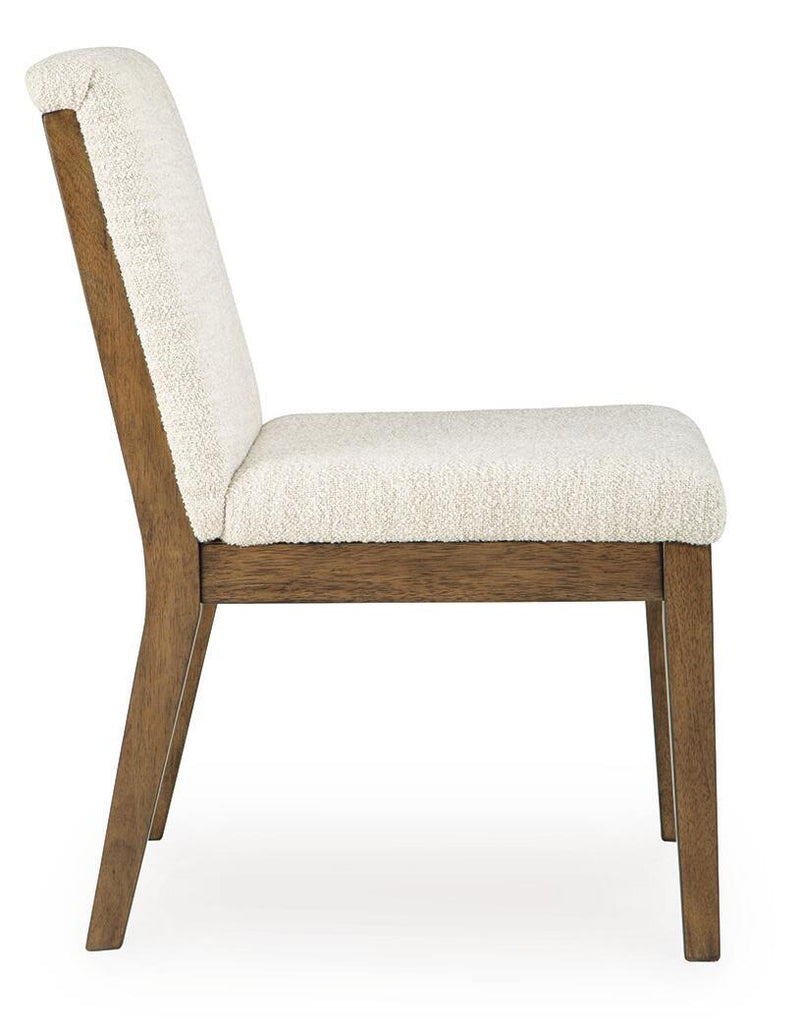 Set of two Benchcraft® Marxmore beige and brown upholstered dining side chairs with padded seats and wooden legs.