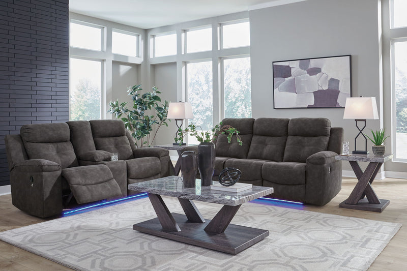 Benchcraft reclining sofa and loveseat set from Brysonview, featuring plush cushions and fabric upholstery in a modern living room setting.