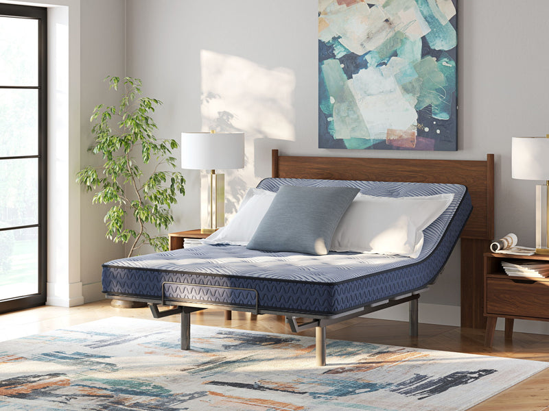 Sierra Sleep® by Ashley Peak 2.0 Bonnell hybrid mattress showing plush surface and supportive design for restful sleep.