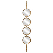 Uttermost wall mirror with a round, button-style frame, featuring a modern design and reflective glass surface.