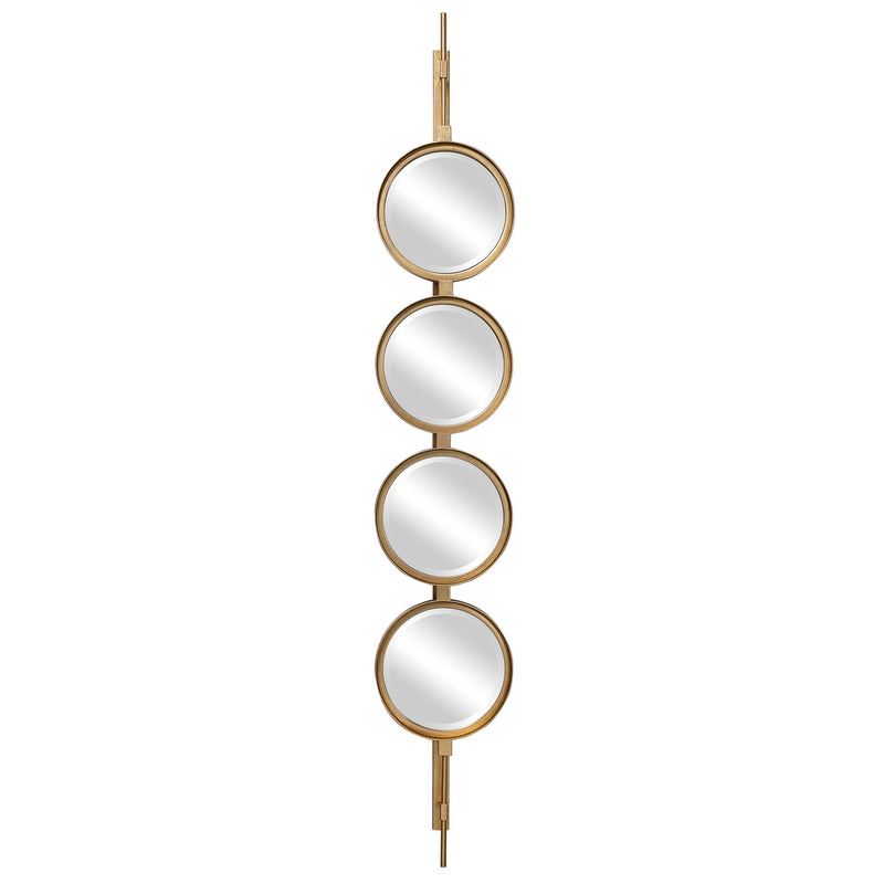 Uttermost wall mirror with a round, button-style frame, featuring a modern design and reflective glass surface.
