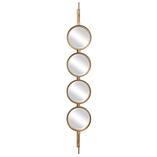 Uttermost wall mirror with a round, button-style frame, featuring a modern design and reflective glass surface.