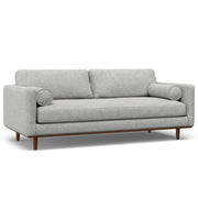 Simpli-Home Morrison upholstered stationary sofa with plush fabric and modern design, featuring wide armrests and cushioned seating.