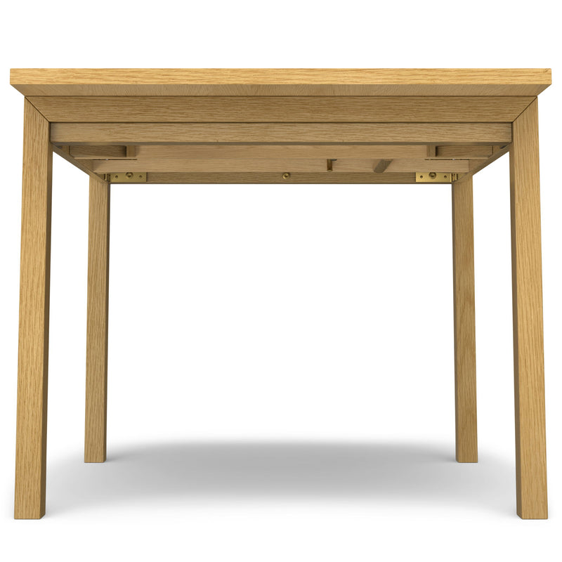 Wilson handcrafted dining table by Simpli-Home, featuring a polished wooden surface and sturdy legs, ideal for family meals.