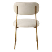 Set of two Capture dining chairs by Uttermost with gold frames and white upholstered seats, showcasing elegant modern design.