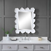 Uttermost Sea Coral wall mirror with a detailed coral design frame, perfect for coastal or nautical decor.