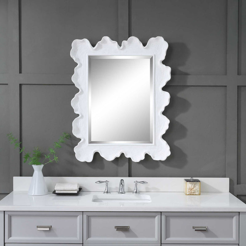 Uttermost Sea Coral wall mirror with a detailed coral design frame, perfect for coastal or nautical decor.