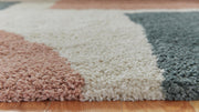 Signature Design by Ashley Flynnwick area rug with geometric pattern in neutral tones, perfect for modern living rooms.