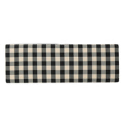 Black Noble House storage ottoman with seating and hidden storage, featuring a contemporary design and soft cushioned top.