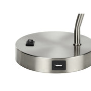 Modern 8th Street nickel table lamp with a silver shade and built-in USB port, featuring a sleek metal design and contemporary style.