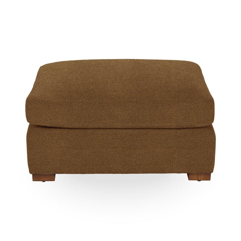 Classic Home Audrey upholstered ottoman with plush fabric and wooden legs, ideal as a versatile footstool or accent piece.