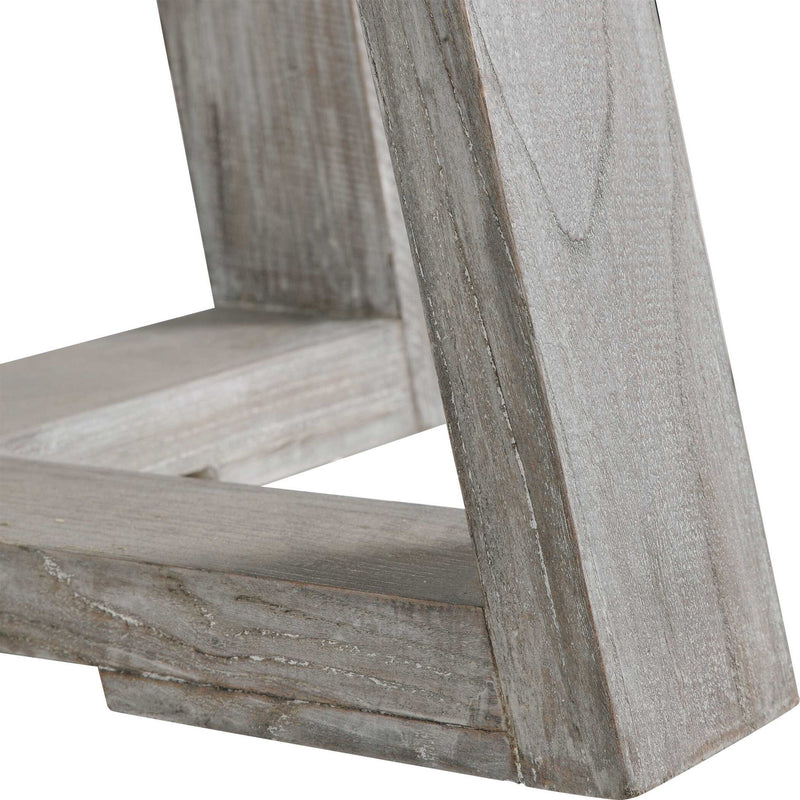 Uttermost Gidran dining table with a sleek wooden surface and modern metal legs, ideal for contemporary dining rooms.