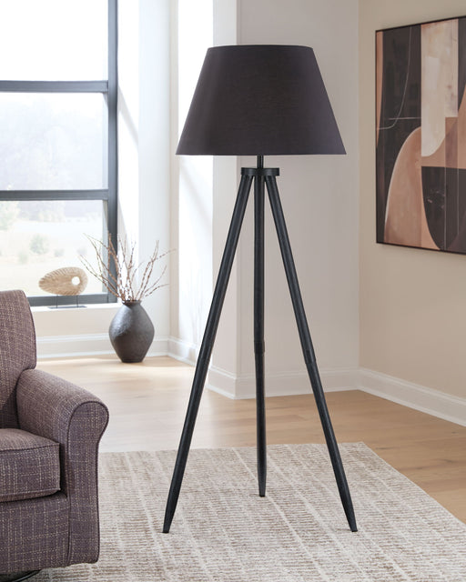 Black Orhan wood floor lamp by Signature Design by Ashley® with a sleek, modern design and wooden base for living room lighting.